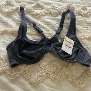New with tags front closure bra, color is ‘blue heather’ 34b. Criss cross back.